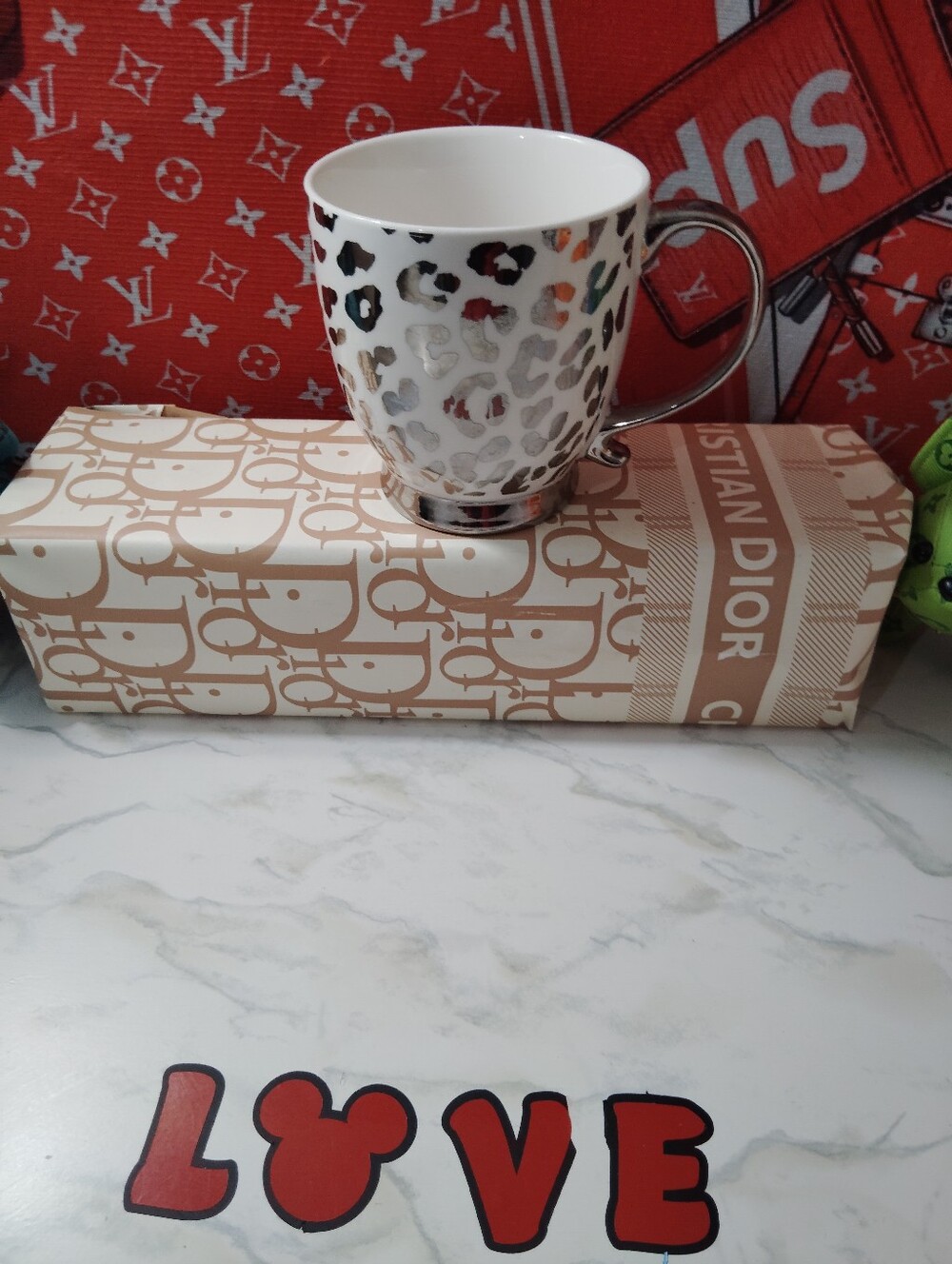 Gibson White Leopard Spot Ceramic Mug with Silver Handle